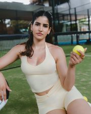 Sporty Actress Sakshi Malik in a Cream Yellow Sports Set Photos 02