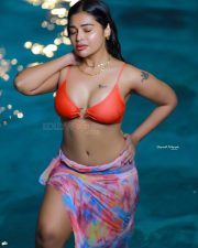 Stunning Dharsha Gupta in an Orange Swimsuit Bikini Pictures 01