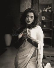 Stunning Ketika Sharma in a White Saree with Full Sleeve Blouse Photos 04 Stunning Ketika Sharma in a White Saree with Full Sleeve Blouse Photos 04