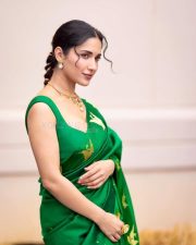 Stunning Ruhani Sharma in an Emerald Green Saree with Golden Peacock Design Photos 01