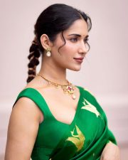 Stunning Ruhani Sharma in an Emerald Green Saree with Golden Peacock Design Photos 06