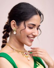 Stunning Ruhani Sharma in an Emerald Green Saree with Golden Peacock Design Photos 07