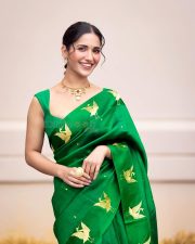 Stunning Ruhani Sharma in an Emerald Green Saree with Golden Peacock Design Photos 09