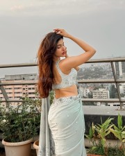 Stunning Sakshi Malik in a Shimmering Cream Colored Saree Pictures 05