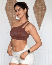 Stunning Sakshi Malik in an One Shoulder Nude Yoga Bra Shorts Photos 01