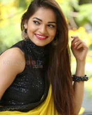 Actress Aswini Beautiful Yellow Saree Photos 20