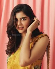 Beautiful Kalyani Priyadarshan in a Yellow Mustard Saree with a Sleeveless Blouse Pictures 02