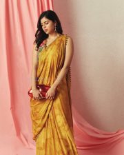 Beautiful Kalyani Priyadarshan in a Yellow Mustard Saree with a Sleeveless Blouse Pictures 06