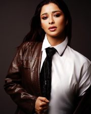 Bold Actress Nyra Banerjee in a White Shirt and Leather Jacket Photos 01