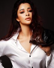 Bold Actress Nyra Banerjee in a White Shirt and Leather Jacket Photos 02