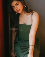 Captivating Actress Kalyani Priyadarshan in a Green Satin Slip Dress Photos 01