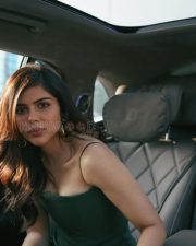 Captivating Actress Kalyani Priyadarshan in a Green Satin Slip Dress Photos 03