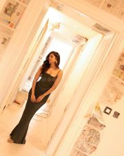 Captivating Actress Kalyani Priyadarshan in a Green Satin Slip Dress Photos 11