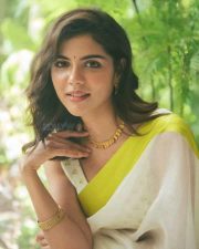 Cute Kalyani Priyadarshan in a White Saree with Green Border Photos 01 Cute Kalyani Priyadarshan in a White Saree with Green Border Photos 01
