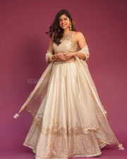 Graceful Actress Kalyani Priyadarshan in a White Gold Embroidered Lehenga Photos 02