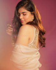 Graceful Actress Kalyani Priyadarshan in a White Gold Embroidered Lehenga Photos 04