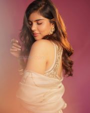 Graceful Actress Kalyani Priyadarshan in a White Gold Embroidered Lehenga Photos 04