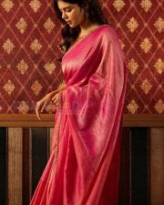 Graceful Kalyani Priyadharsan in a Pink Saree with a Sleeveless Blouse Photos 05