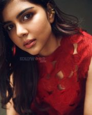 Lokah Chapter 1 Chandra Heroine Kalyani Priyadarshan in a Stylish Red Top and Dark Blue Denim Jeans Photos 01