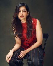 Lokah Chapter 1 Chandra Heroine Kalyani Priyadarshan in a Stylish Red Top and Dark Blue Denim Jeans Photos 02 Lokah Chapter 1 Chandra Heroine Kalyani Priyadarshan in a Stylish Red Top and Dark Blue Denim Jeans Photos 02