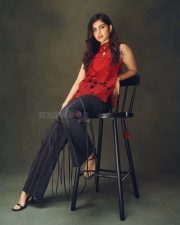 Lokah Chapter 1 Chandra Heroine Kalyani Priyadarshan in a Stylish Red Top and Dark Blue Denim Jeans Photos 05