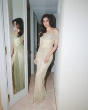 Mesmerizing Kalyani Priyadarshan in a Shimmering Liquid Gold Sequin Floor Length Gown Pictures 04