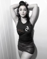 One Two Cha Cha Cha Actress Nyra Banerjee in a Black Ribbed Tank Top with a Chocolate Leather Mini Skirt Photos 02
