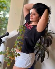 Actress Poonam Bajwa in Black T Shirt and White Mini Shorts Photos 03