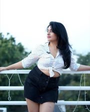 Beautiful Busty Poonam Bajwa in a White Polka Dot Printed Front Knotted Shirt with a High Waisted Denim Mini Skirt Photos 02
