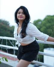 Beautiful Busty Poonam Bajwa in a White Polka Dot Printed Front Knotted Shirt with a High Waisted Denim Mini Skirt Photos 03