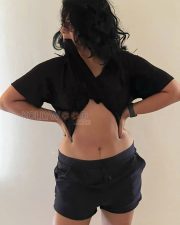 Bold Actress Poonam Bajwa in a Black Sheer Crop Top And Navy Shorts Photos 03