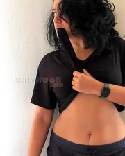 Bold Actress Poonam Bajwa in a Black Sheer Crop Top And Navy Shorts Photos 04