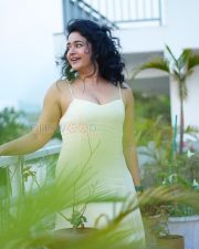 Radiant Actress Poonam Bajwa in a Pale Yellow Spaghetti Strap Dress Photos 01