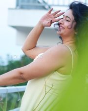 Radiant Actress Poonam Bajwa in a Pale Yellow Spaghetti Strap Dress Photos 04