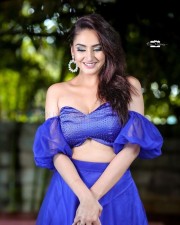 Actress Ragini Dwivedi in a Sleeveless Blue Dress Pictures 01