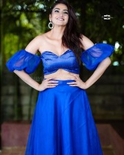Actress Ragini Dwivedi in a Sleeveless Blue Dress Pictures 06