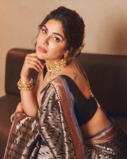 Actress Samyuktha Menon in a Dark Traditional Handloom Silk Saree with a Simple Sleeveless Black Blouse Pictures 05