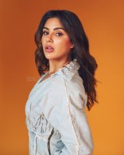 Actress Samyuktha Menon in a Light Wash Denim Shirt with a Deep V Neckline with a Matching Skirt Pictures 02