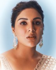 Beautiful Samyuktha Menon in an Ivory Embroidered Saree with Sleeveless Blouse Photos 01