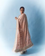 Beautiful Samyuktha Menon in an Ivory Embroidered Saree with Sleeveless Blouse Photos 02