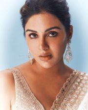 Beautiful Samyuktha Menon in an Ivory Embroidered Saree with Sleeveless Blouse Photos 03