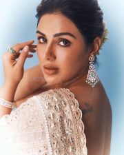 Beautiful Samyuktha Menon in an Ivory Embroidered Saree with Sleeveless Blouse Photos 05