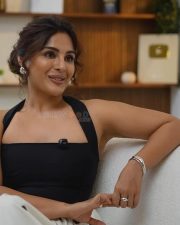 Charming Actress Samyuktha Menon in a Black Halter Top and Polka Dot Skirt Photos 04