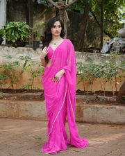Chic Actress Jannat Zubair in a Magenta Saree with Cropped Blouse Photos 06