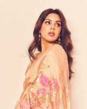 Elegant Actress Samyuktha Menon in a Peach Floral Embroidered Saree Photos 01