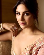 Elegant Actress Samyuktha Menon in a pink embroidered traditional saree photos 02