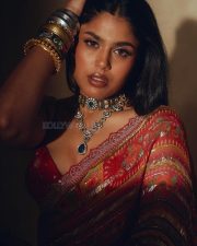 Heroine Faria Abdullah in a Red Designer Saree with a Matching Berry Blouse Photos 03