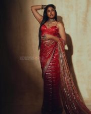 Heroine Faria Abdullah in a Red Designer Saree with a Matching Berry Blouse Photos 05