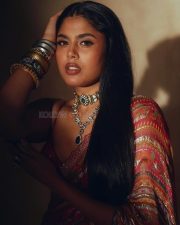 Heroine Faria Abdullah in a Red Designer Saree with a Matching Berry Blouse Photos 06
