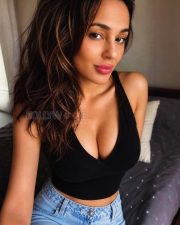 Seductive Seerat Kapoor Cleavage in a Black Deep V Halter Crop Top and Jeans Photos 01